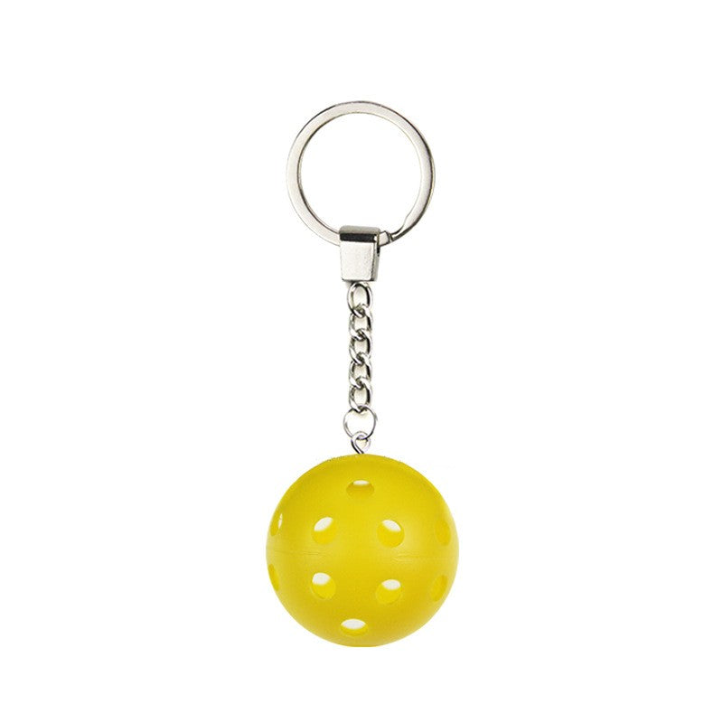 Pickleball Keychain shown on paddle as a color-customized personalized paddle band for pickleball players, ideal for paddle ID, team branding, and custom gear This image features custom pickleball paddle bands, a personalized paddle band, and a customized paddle band, ideal for player ID, team branding, club gear, and tournament accessories.