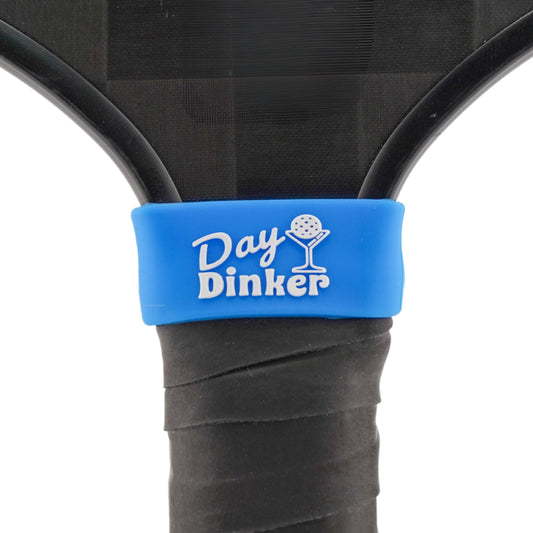Day Dinker Pickleball Band shown on paddle as a color-customized personalized paddle band for pickleball players, ideal for paddle ID, team branding, and custom gear This image features custom pickleball paddle bands, a personalized paddle band, and a customized paddle band, ideal for player ID, team branding, club gear, and tournament accessories.