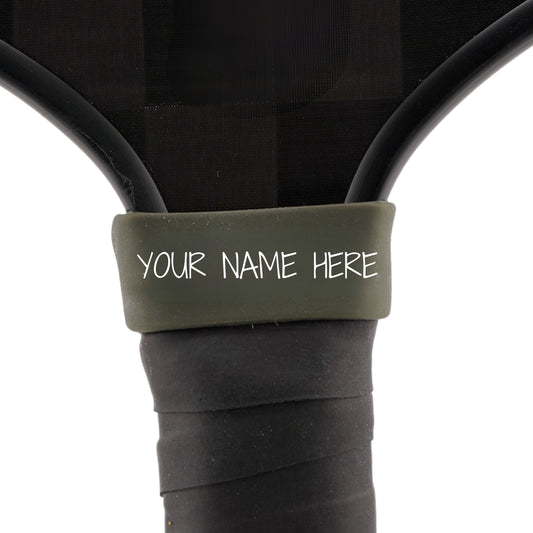 Graphite Grey Paddle Band shown on paddle as a color-customized personalized paddle band for pickleball players, ideal for paddle ID, team branding, and custom gear This image features custom pickleball paddle bands, a personalized paddle band, and a customized paddle band, ideal for player ID, team branding, club gear, and tournament accessories.