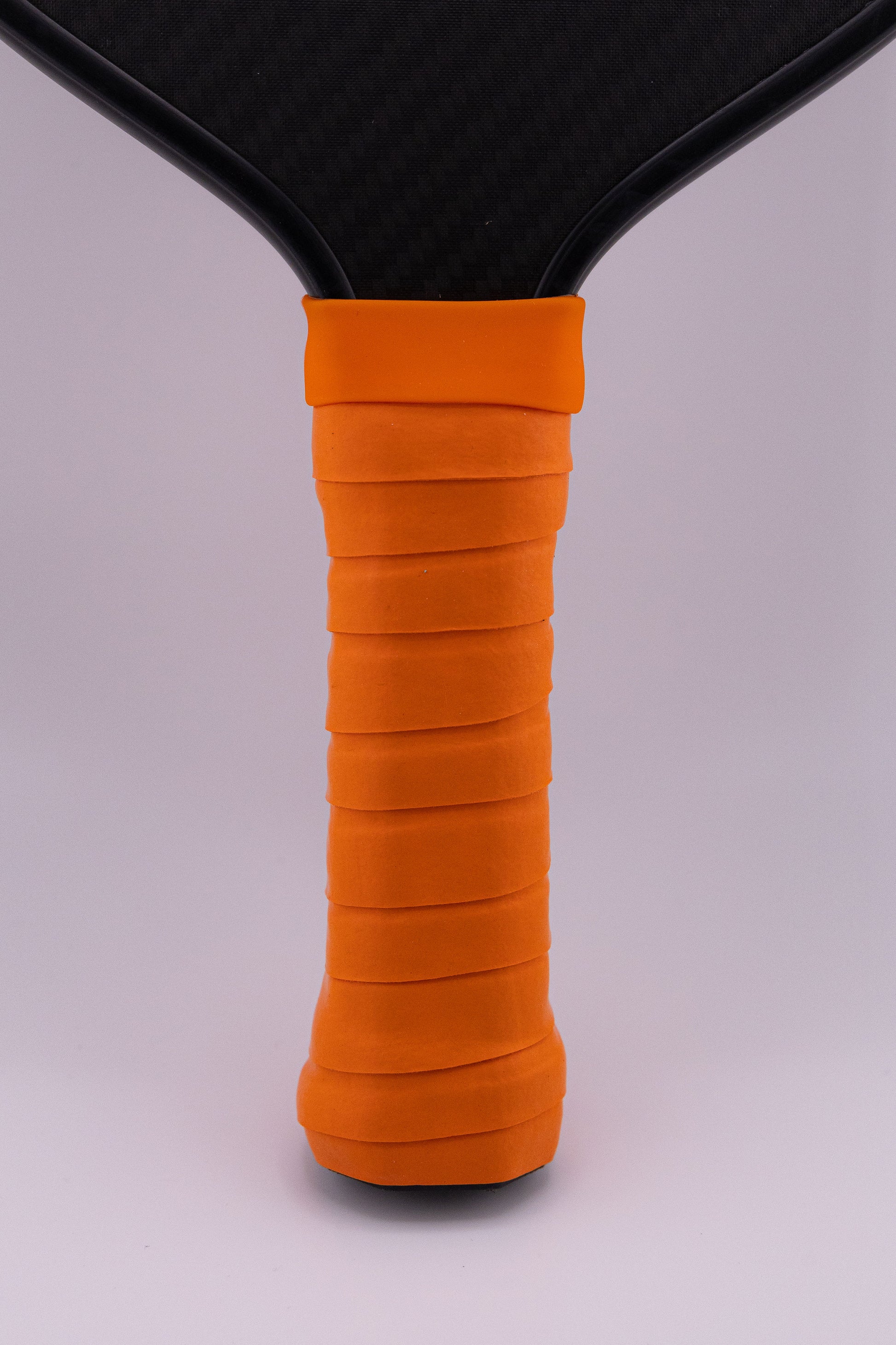 Paddle Overgrip - Grip tape shown on paddle as a color-customized personalized paddle band for pickleball players, ideal for paddle ID, team branding, and custom gear This image features custom pickleball paddle bands, a personalized paddle band, and a customized paddle band, ideal for player ID, team branding, club gear, and tournament accessories.