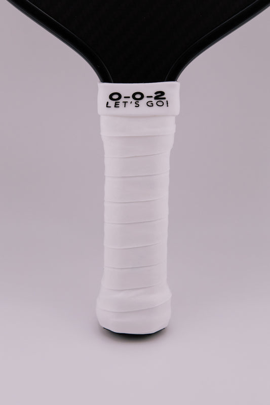 Paddle Overgrip - Grip tape shown on paddle as a color-customized personalized paddle band for pickleball players, ideal for paddle ID, team branding, and custom gear This image features custom pickleball paddle bands, a personalized paddle band, and a customized paddle band, ideal for player ID, team branding, club gear, and tournament accessories.