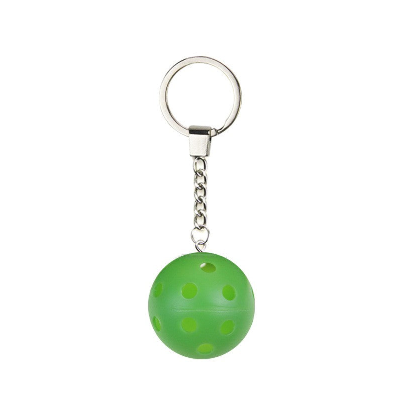 Pickleball Keychain shown on paddle as a color-customized personalized paddle band for pickleball players, ideal for paddle ID, team branding, and custom gear This image features custom pickleball paddle bands, a personalized paddle band, and a customized paddle band, ideal for player ID, team branding, club gear, and tournament accessories.
