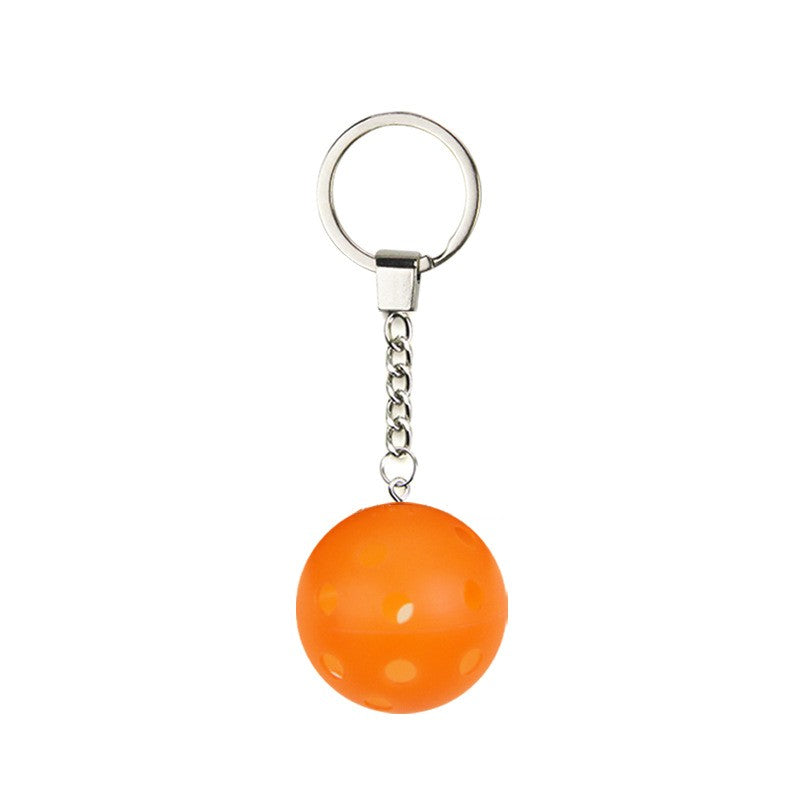 Pickleball Keychain shown on paddle as a color-customized personalized paddle band for pickleball players, ideal for paddle ID, team branding, and custom gear This image features custom pickleball paddle bands, a personalized paddle band, and a customized paddle band, ideal for player ID, team branding, club gear, and tournament accessories.