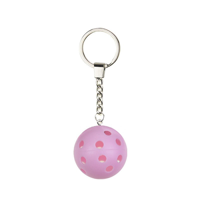 Pickleball Keychain shown on paddle as a color-customized personalized paddle band for pickleball players, ideal for paddle ID, team branding, and custom gear This image features custom pickleball paddle bands, a personalized paddle band, and a customized paddle band, ideal for player ID, team branding, club gear, and tournament accessories.