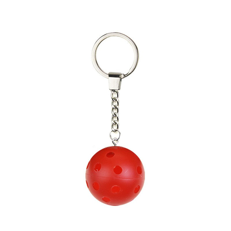 Pickleball Keychain shown on paddle as a color-customized personalized paddle band for pickleball players, ideal for paddle ID, team branding, and custom gear This image features custom pickleball paddle bands, a personalized paddle band, and a customized paddle band, ideal for player ID, team branding, club gear, and tournament accessories.