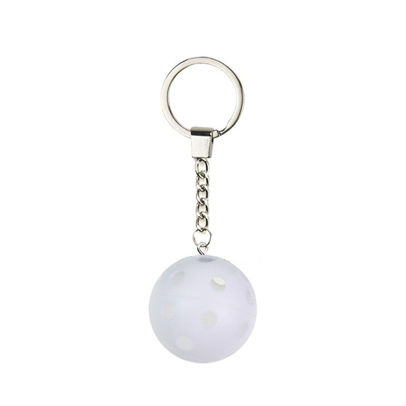 Pickleball Keychain shown on paddle as a color-customized personalized paddle band for pickleball players, ideal for paddle ID, team branding, and custom gear This image features custom pickleball paddle bands, a personalized paddle band, and a customized paddle band, ideal for player ID, team branding, club gear, and tournament accessories.